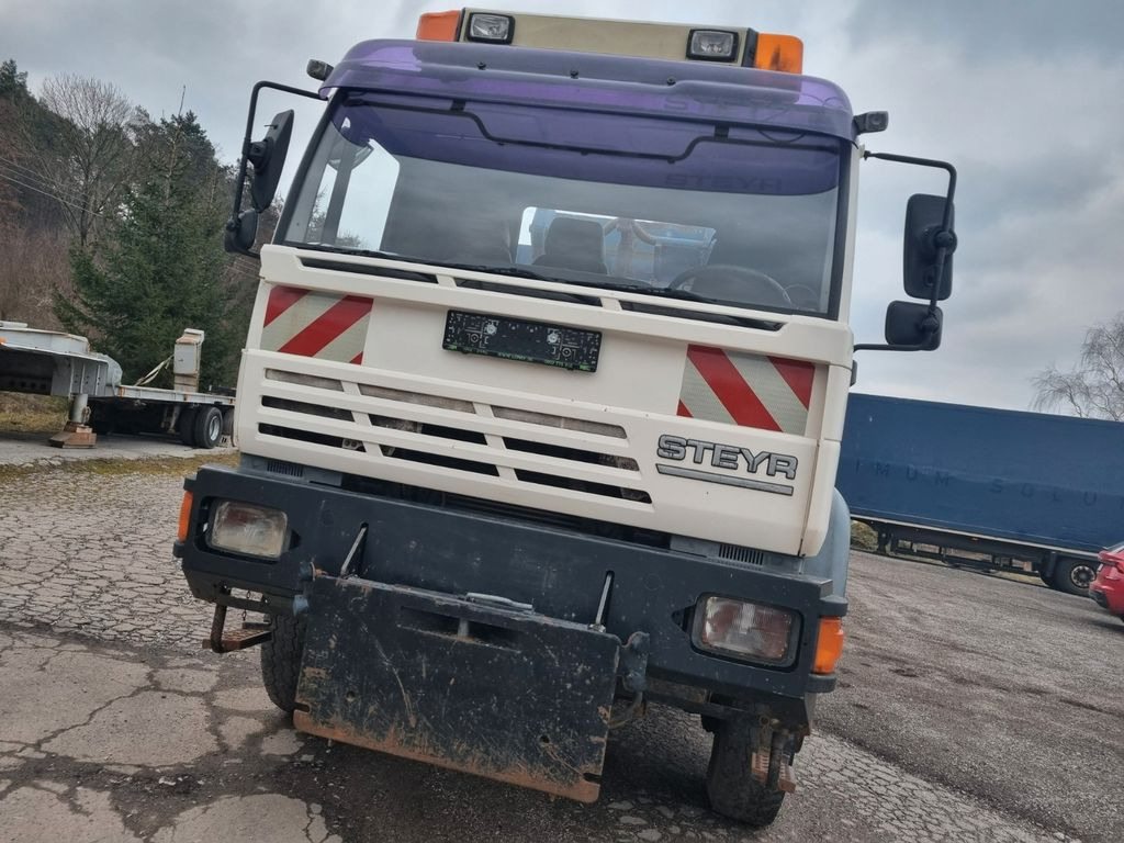 MAN (STEYR) 18.284 4x4 abrollkipper - Camião polibenne: foto 2 MAN (STEYR) 18.284 4x4 abrollkipper - Camião polibenne: foto 2