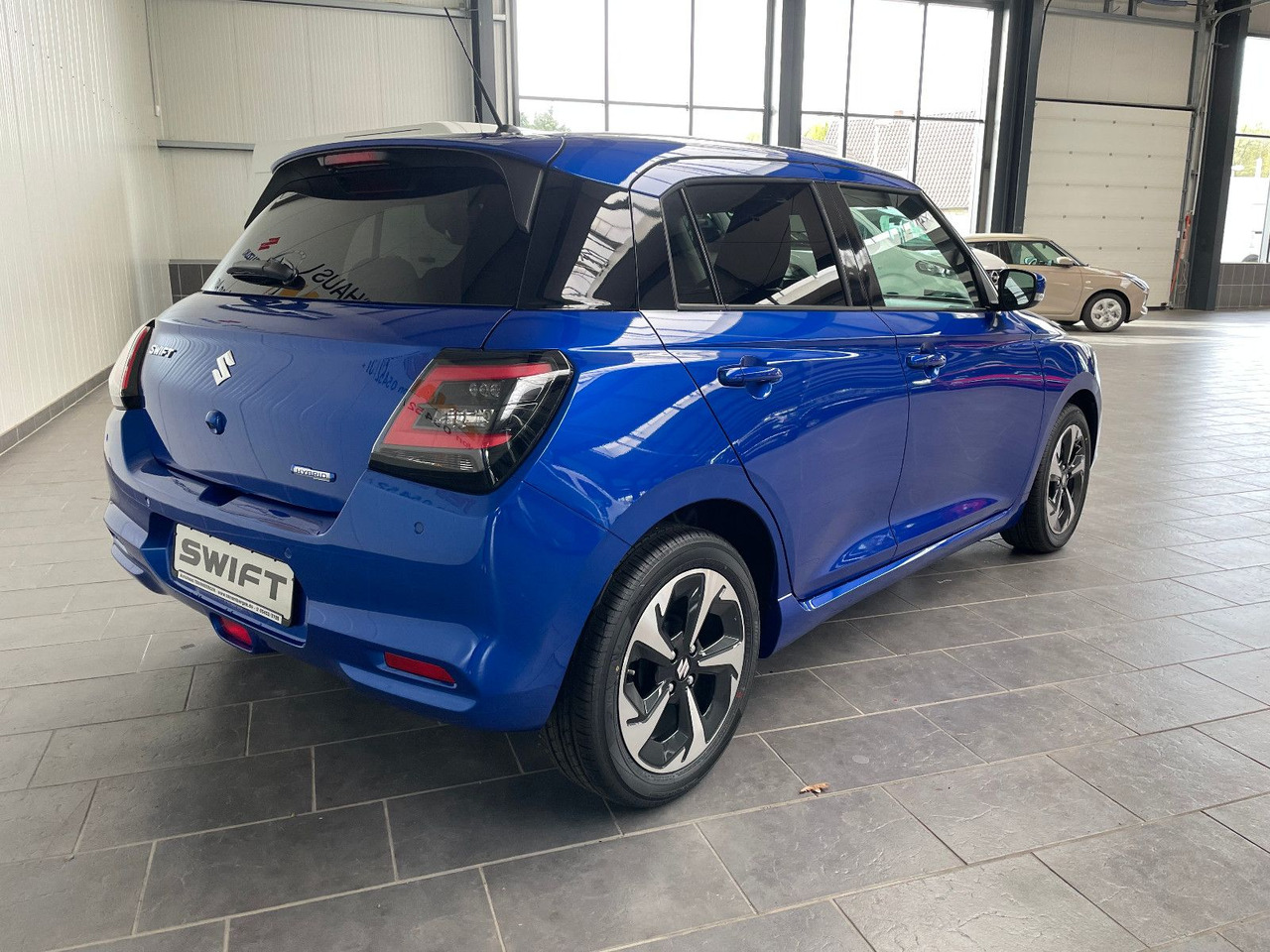 Suzuki Swift 1.2 DUALJET HYBRID Comfort+ - Automóvel: foto 3 Suzuki Swift 1.2 DUALJET HYBRID Comfort+ - Automóvel: foto 3
