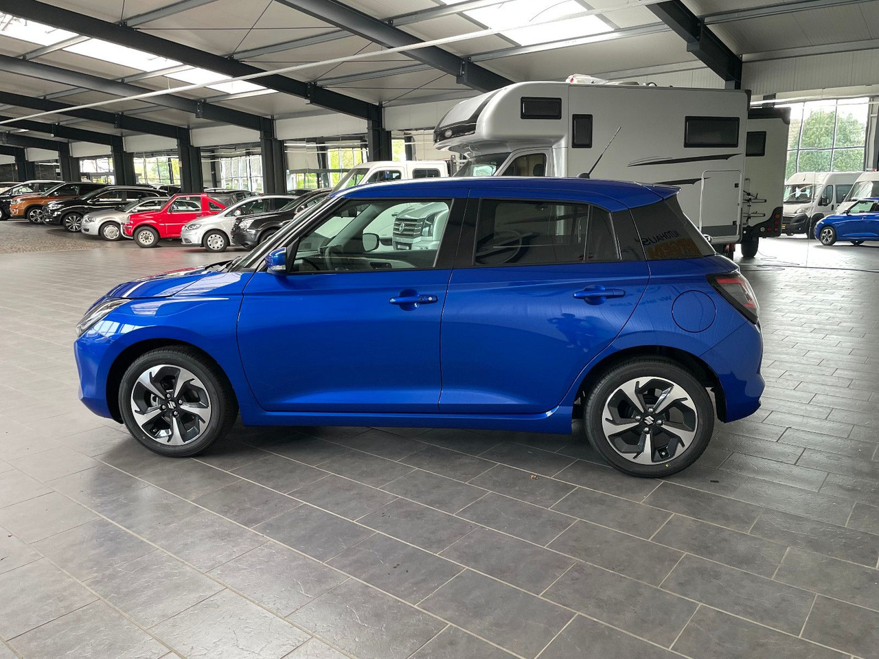 Suzuki Swift 1.2 DUALJET HYBRID Comfort+ - Automóvel: foto 5 Suzuki Swift 1.2 DUALJET HYBRID Comfort+ - Automóvel: foto 5