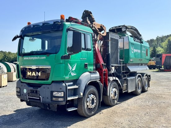 MAN TGS 35.540 8x4 mit Komptech-Zusatzeinheit - Equipamento florestal, Camião: foto 1 MAN TGS 35.540 8x4 mit Komptech-Zusatzeinheit - Equipamento florestal, Camião: foto 1