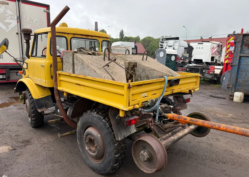 Mercedes-Benz UNIMOG 406B - Camião de caixa aberta/ Plataforma: foto 3 Mercedes-Benz UNIMOG 406B - Camião de caixa aberta/ Plataforma: foto 3