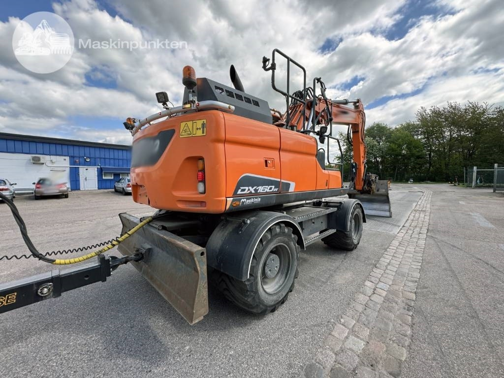 Doosan DX 160 W - Escavadeira de rodas: foto 4 Doosan DX 160 W - Escavadeira de rodas: foto 4