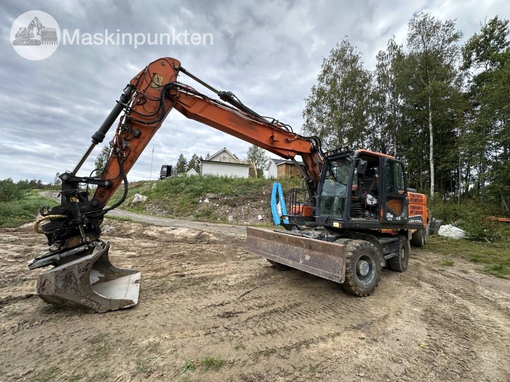 Doosan DX 170 W - Escavadeira de rodas: foto 1 Doosan DX 170 W - Escavadeira de rodas: foto 1