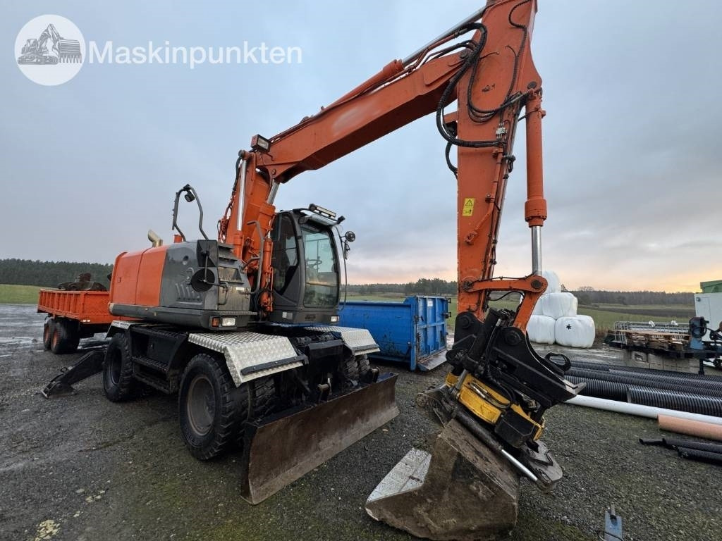 Hitachi ZX 140 W-3 Med vagn och redskap! - Escavadeira de rodas: foto 4 Hitachi ZX 140 W-3 Med vagn och redskap! - Escavadeira de rodas: foto 4