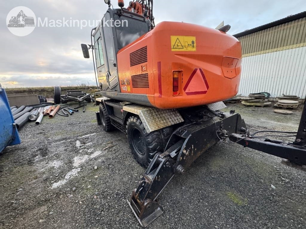 Hitachi ZX 140 W-3 Med vagn och redskap! - Escavadeira de rodas: foto 2 Hitachi ZX 140 W-3 Med vagn och redskap! - Escavadeira de rodas: foto 2