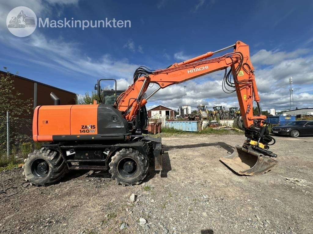 Hitachi ZX 140 W-5B - Escavadeira de rodas: foto 4 Hitachi ZX 140 W-5B - Escavadeira de rodas: foto 4