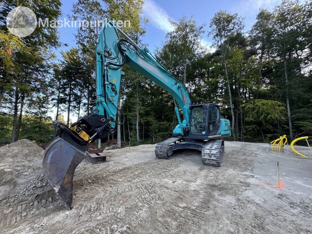 Kobelco SK 210 LC-10 - Escavadora de rastos: foto 1 Kobelco SK 210 LC-10 - Escavadora de rastos: foto 1