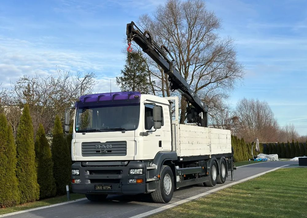 MAN TGA 24.410 6x4 HIAB MANUAL - Camião grua, Camião de caixa aberta/ Plataforma: foto 1 MAN TGA 24.410 6x4 HIAB MANUAL - Camião grua, Camião de caixa aberta/ Plataforma: foto 1