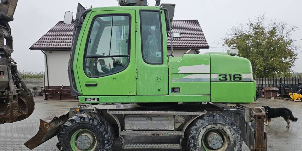 Escavadeira de rodas Koparka kołowa Liebherr A 316 Litronic chwytak podpory pług: foto 7 Escavadeira de rodas Koparka kołowa Liebherr A 316 Litronic chwytak podpory pług: foto 7