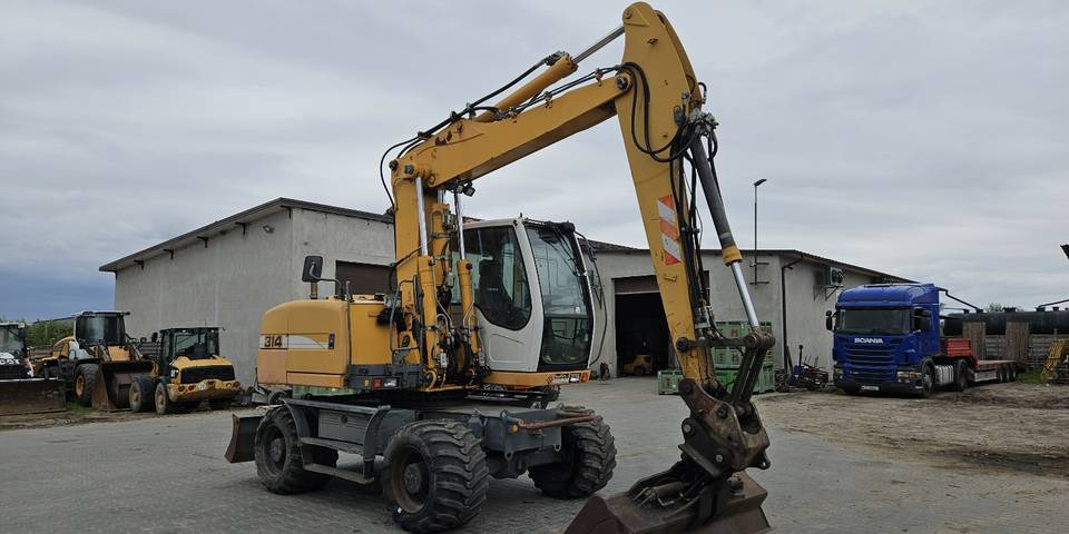 Koparka kołowa Liebherr A314 Litronic 9350 h 4 łyżki kołówka - Escavadeira de rodas: foto 4 Koparka kołowa Liebherr A314 Litronic 9350 h 4 łyżki kołówka - Escavadeira de rodas: foto 4