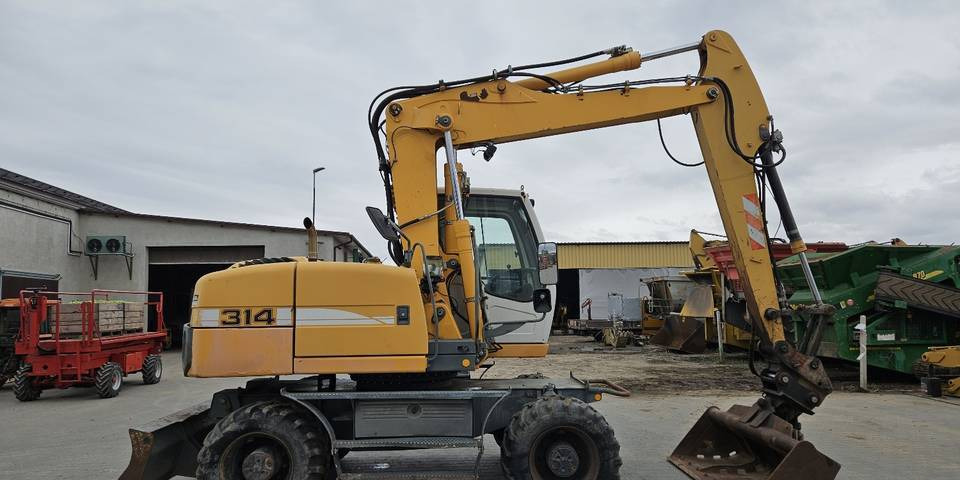 Koparka kołowa Liebherr A314 Litronic 9350 h 4 łyżki kołówka - Escavadeira de rodas: foto 5 Koparka kołowa Liebherr A314 Litronic 9350 h 4 łyżki kołówka - Escavadeira de rodas: foto 5