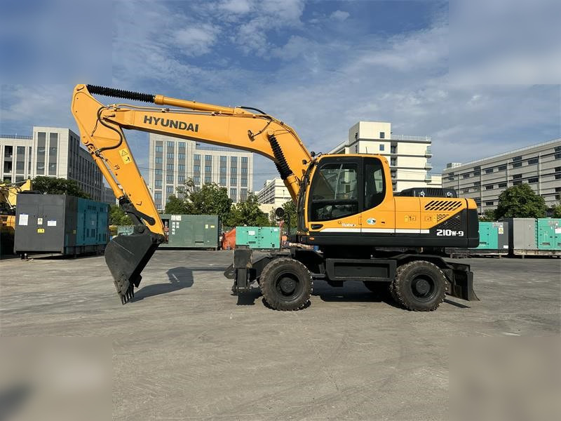 HYUNDAI ROBEX 210W-9 - Escavadeira de rodas: foto 1 HYUNDAI ROBEX 210W-9 - Escavadeira de rodas: foto 1