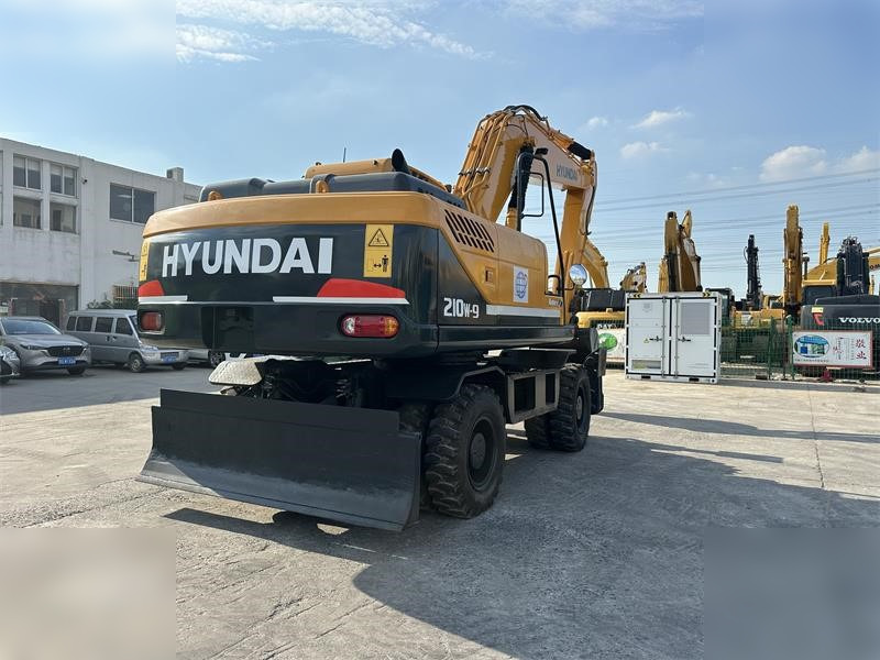HYUNDAI ROBEX 210W-9 - Escavadeira de rodas: foto 3 HYUNDAI ROBEX 210W-9 - Escavadeira de rodas: foto 3