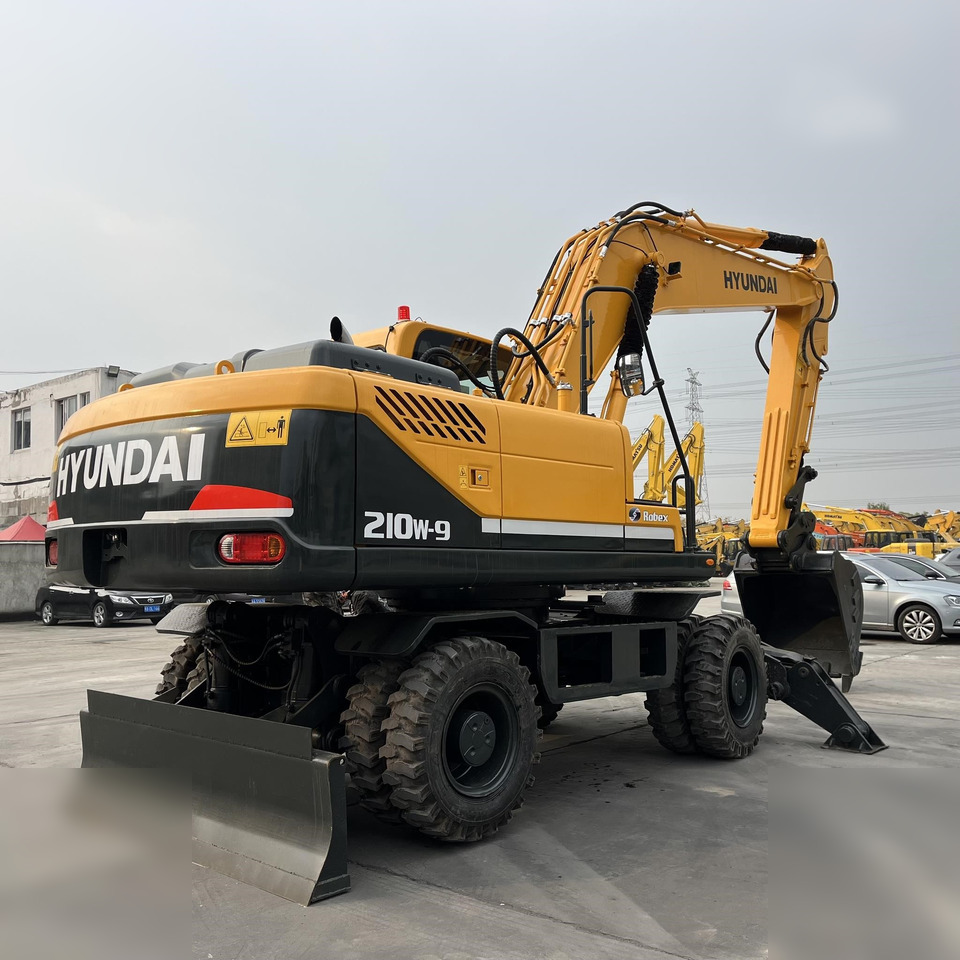HYUNDAI ROBEX 210W-9 - Escavadeira de rodas: foto 3 HYUNDAI ROBEX 210W-9 - Escavadeira de rodas: foto 3