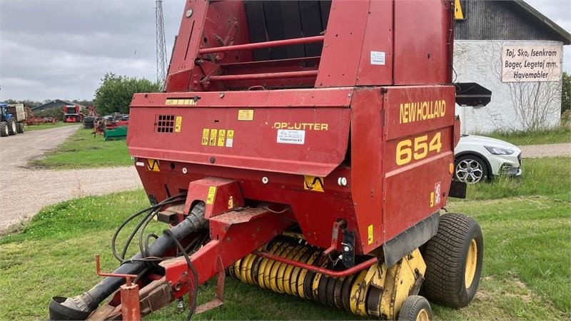 New Holland 654 RUNDBALLEPRESSER Cropcutter - Enfardadeira de fardos redondos: foto 2 New Holland 654 RUNDBALLEPRESSER Cropcutter - Enfardadeira de fardos redondos: foto 2