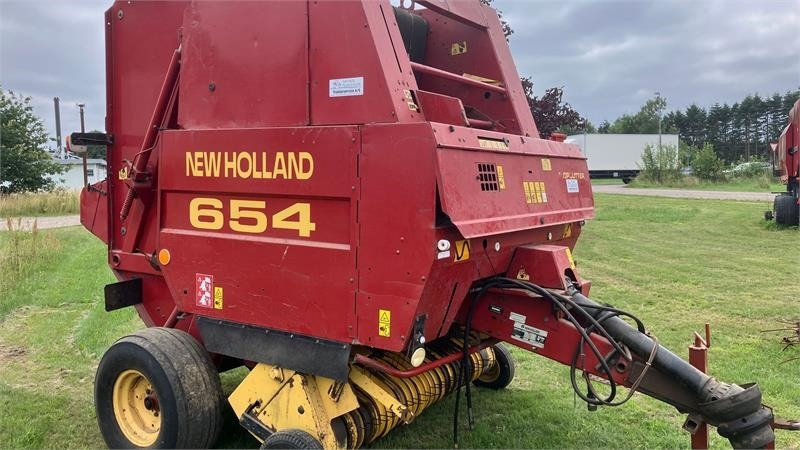 New Holland 654 RUNDBALLEPRESSER Cropcutter - Enfardadeira de fardos redondos: foto 1 New Holland 654 RUNDBALLEPRESSER Cropcutter - Enfardadeira de fardos redondos: foto 1