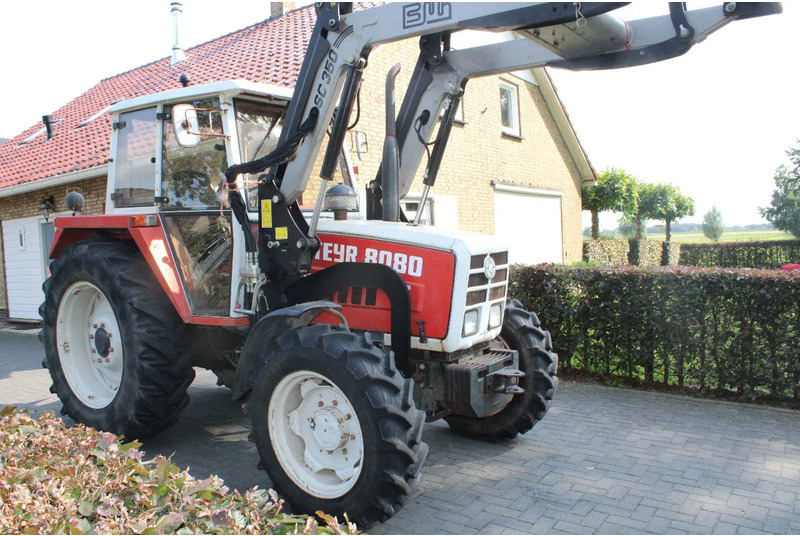 Steyr 8080 met voorlader 40 kmh - Trator: foto 1 Steyr 8080 met voorlader 40 kmh - Trator: foto 1