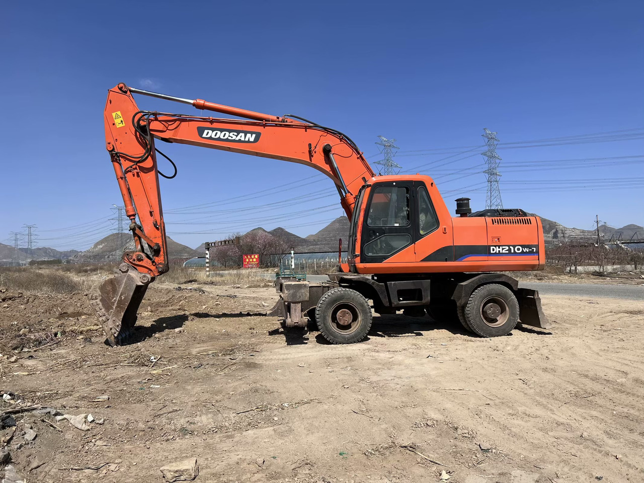 Escavadeira de rodas DOOSAN 210w: foto 12