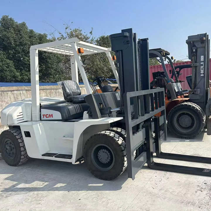 High Quality TCM 7 Ton with Hydraulic Distance Adjustment Used Forklift in Stock Used tcm Forklift 7 Ton Used tcm Fd70 Forklift - Empilhadeira: foto 1 High Quality TCM 7 Ton with Hydraulic Distance Adjustment Used Forklift in Stock Used tcm Forklift 7 Ton Used tcm Fd70 Forklift - Empilhadeira: foto 1
