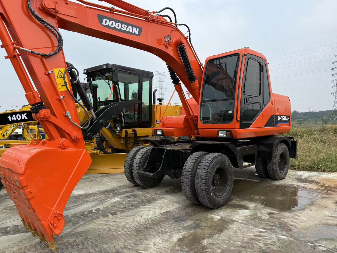 DOOSAN Good Condition Original Doosan DH150w-7 Wheel Excavator 15 Tons Used Doosan Dh150w-7 Excavator Used Wheel Excavator for Sale - Escavadeira de rodas: foto 1 DOOSAN Good Condition Original Doosan DH150w-7 Wheel Excavator 15 Tons Used Doosan Dh150w-7 Excavator Used Wheel Excavator for Sale - Escavadeira de rodas: foto 1