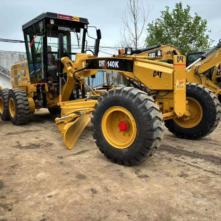Used Cat 140K New Model Grader Popular Brand Japan Cat Hydraulic Machinery Construction Equipment - Motoniveladora: foto 1 Used Cat 140K New Model Grader Popular Brand Japan Cat Hydraulic Machinery Construction Equipment - Motoniveladora: foto 1