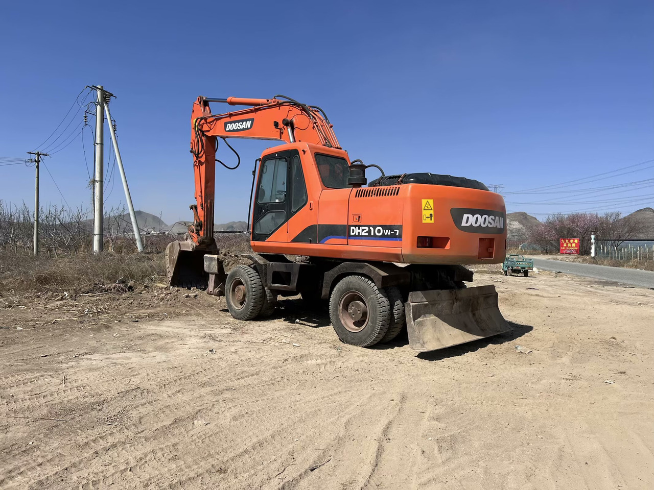 DOOSAN DH210W-7 - Escavadeira de rodas: foto 3 DOOSAN DH210W-7 - Escavadeira de rodas: foto 3