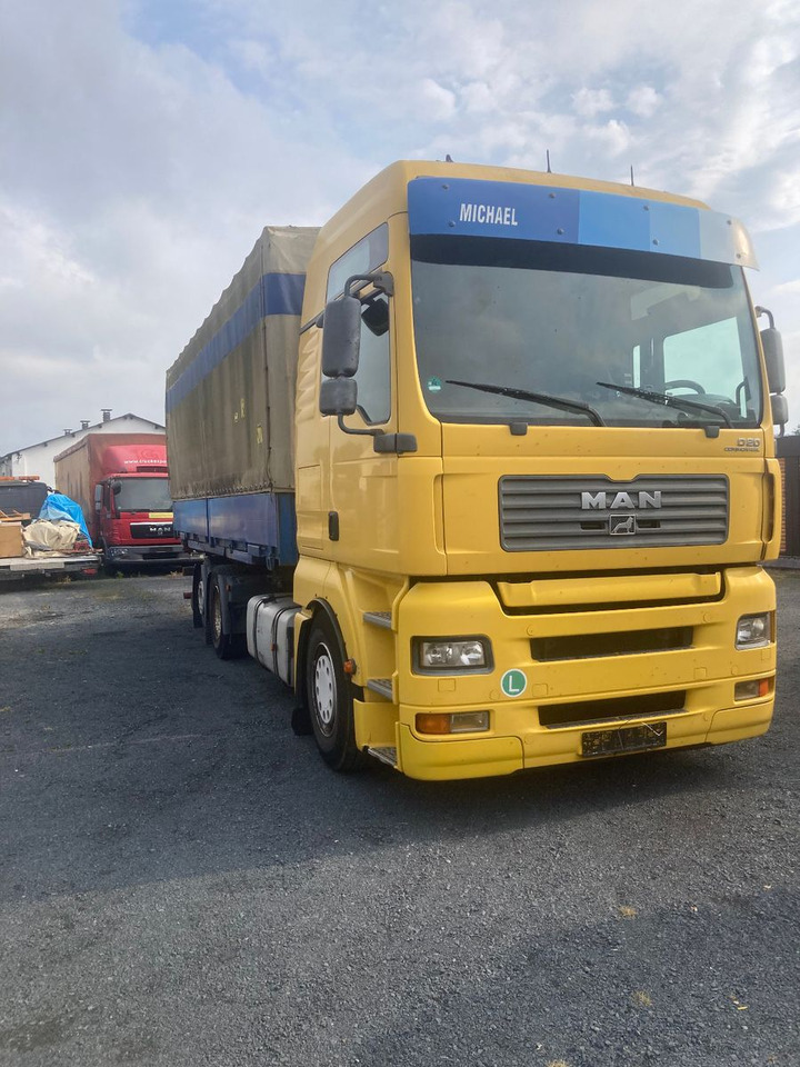 MAN TGA 26.430 FG 6x2 LL Mit EINER BRÜCKE - Camião transportador de contêineres/ Caixa móvel: foto 2 MAN TGA 26.430 FG 6x2 LL Mit EINER BRÜCKE - Camião transportador de contêineres/ Caixa móvel: foto 2