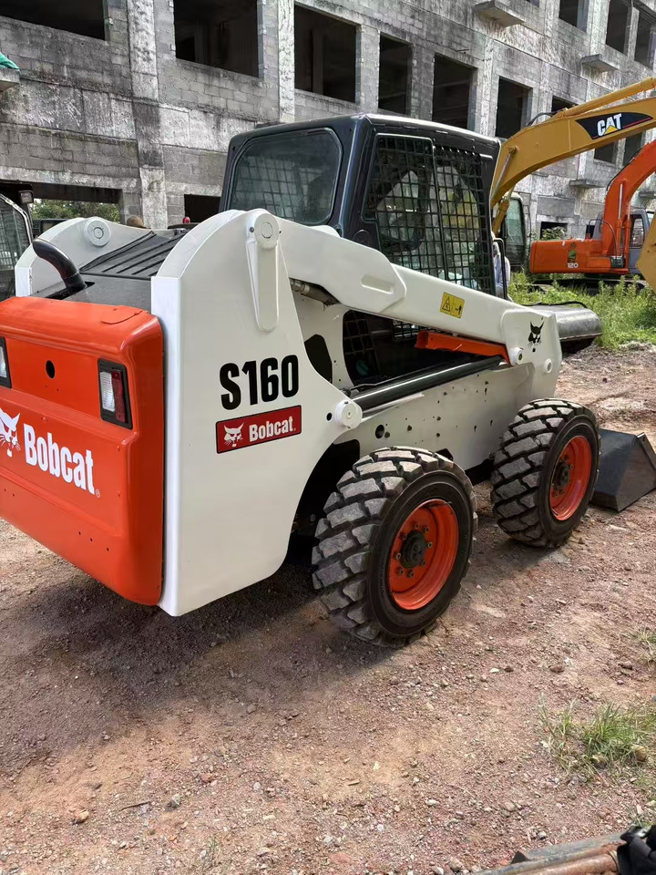 Mini pá carregadora BOBCAT S180: foto 1