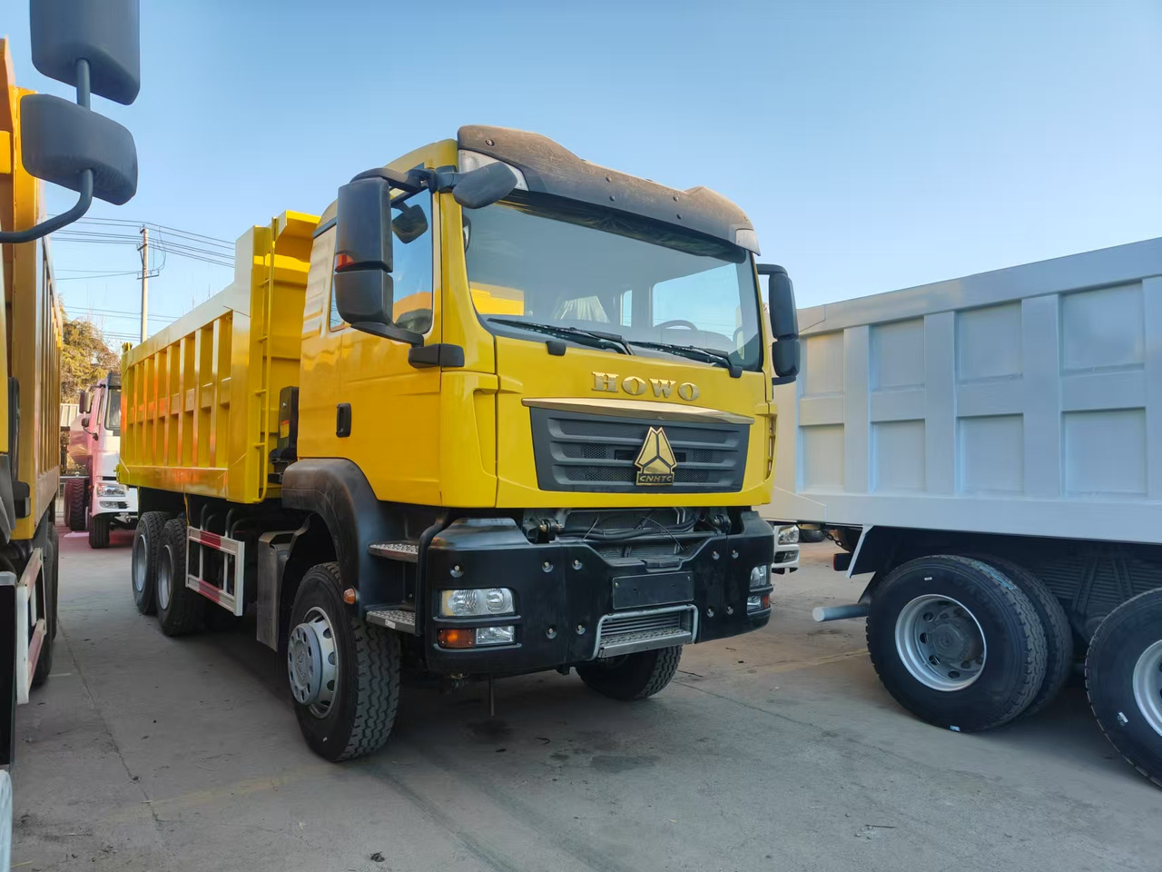 SINOTRUK T5G 6X4 CLICK HERE FOR DISCOUNT - Camião basculante: foto 1 SINOTRUK T5G 6X4 CLICK HERE FOR DISCOUNT - Camião basculante: foto 1