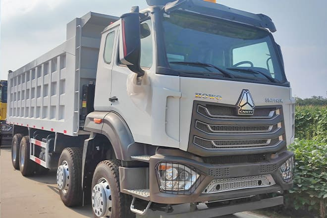 SINOTRUK Sinotruk Howo 8x4 Dump Truck for Sale in Guinea - Camião basculante: foto 1 SINOTRUK Sinotruk Howo 8x4 Dump Truck for Sale in Guinea - Camião basculante: foto 1
