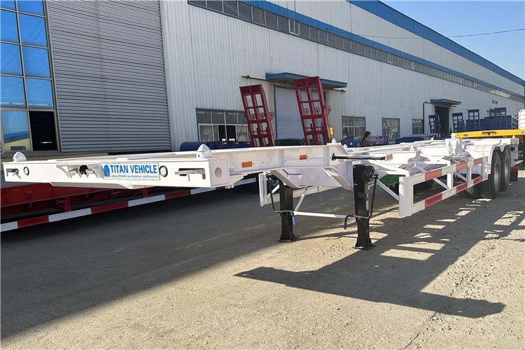 TITAN 2 Axle 40ft Container Transport Trailer for Sale In Nigeria - Semi-reboque chassi: foto 1 TITAN 2 Axle 40ft Container Transport Trailer for Sale In Nigeria - Semi-reboque chassi: foto 1