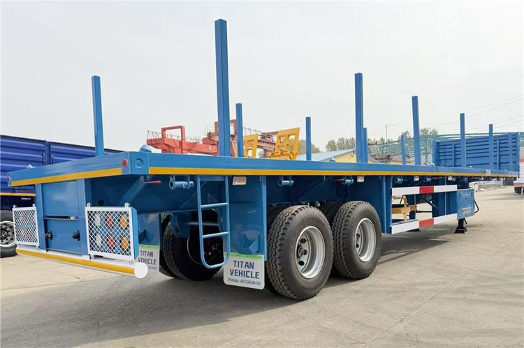 TITAN 2 Axle Wood Log Trailer Flatbed Trailer for Sale In Zimbabwe - Semi-reboque transporte de madeira: foto 1 TITAN 2 Axle Wood Log Trailer Flatbed Trailer for Sale In Zimbabwe - Semi-reboque transporte de madeira: foto 1