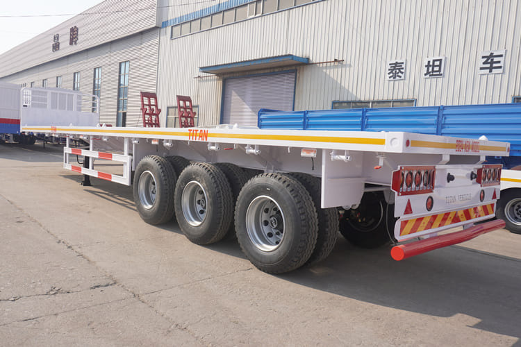 TITAN 3 Axle 40 FT Flatbed Trailer with Front Board - Semi-reboque plataforma/ Caixa aberta: foto 3 TITAN 3 Axle 40 FT Flatbed Trailer with Front Board - Semi-reboque plataforma/ Caixa aberta: foto 3