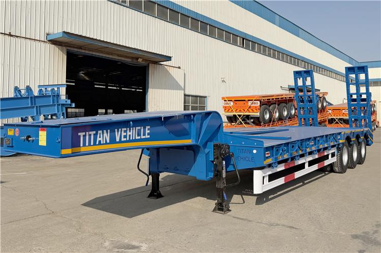 TITAN 3 Axle 80 Ton Low Bed Trailer Price for Sale In Nigeria - Semi-reboque baixa: foto 1 TITAN 3 Axle 80 Ton Low Bed Trailer Price for Sale In Nigeria - Semi-reboque baixa: foto 1