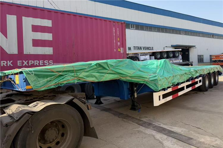 TITAN 3 Axle 80 Ton Low Bed Trailer Price for Sale In Nigeria - Semi-reboque baixa: foto 4 TITAN 3 Axle 80 Ton Low Bed Trailer Price for Sale In Nigeria - Semi-reboque baixa: foto 4