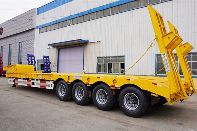 TITAN 4 Axle Lowbed Trailer Truck for Sale in Zambia - Semi-reboque baixa: foto 3 TITAN 4 Axle Lowbed Trailer Truck for Sale in Zambia - Semi-reboque baixa: foto 3