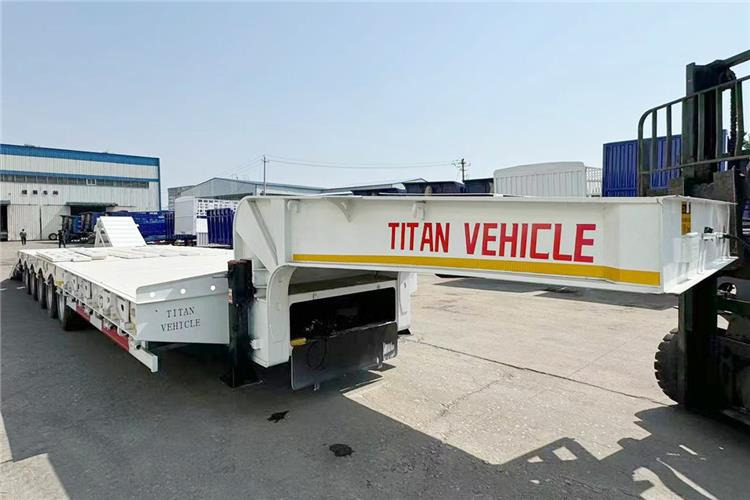 TITAN 5 Axle 100 Ton Low Bed Trailer for Sale In Tanzania - Semi-reboque baixa: foto 5 TITAN 5 Axle 100 Ton Low Bed Trailer for Sale In Tanzania - Semi-reboque baixa: foto 5