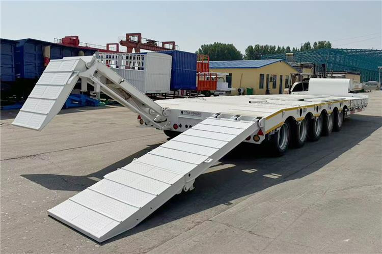 TITAN 5 Axle 100 Ton Low Bed Trailer for Sale In Tanzania - Semi-reboque baixa: foto 2 TITAN 5 Axle 100 Ton Low Bed Trailer for Sale In Tanzania - Semi-reboque baixa: foto 2