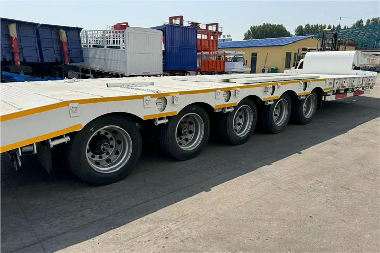 TITAN 5 Axle 100 Ton Low Bed Trailer for Sale In Tanzania - Semi-reboque baixa: foto 3 TITAN 5 Axle 100 Ton Low Bed Trailer for Sale In Tanzania - Semi-reboque baixa: foto 3