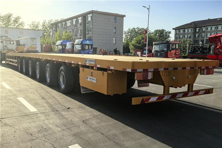 TITAN 6 Axle 62m Extendable Trailer for Sale In Ghana - Semi-reboque plataforma/ Caixa aberta: foto 2 TITAN 6 Axle 62m Extendable Trailer for Sale In Ghana - Semi-reboque plataforma/ Caixa aberta: foto 2