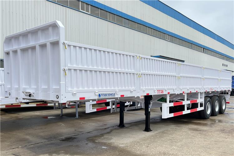 TITAN Tri Axle Dropside Trailer For Sale In Nigeria Lagos - Semi-reboque plataforma/ Caixa aberta: foto 1 TITAN Tri Axle Dropside Trailer For Sale In Nigeria Lagos - Semi-reboque plataforma/ Caixa aberta: foto 1