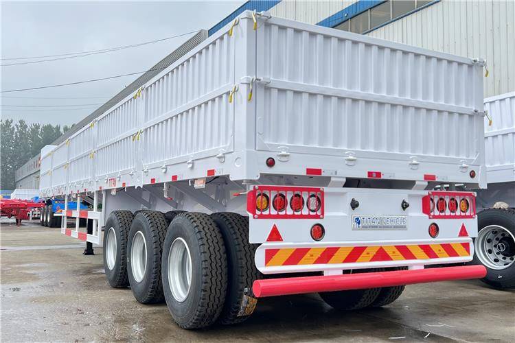 TITAN Tri Axle Dropside Trailer For Sale In Nigeria Lagos - Semi-reboque plataforma/ Caixa aberta: foto 3 TITAN Tri Axle Dropside Trailer For Sale In Nigeria Lagos - Semi-reboque plataforma/ Caixa aberta: foto 3