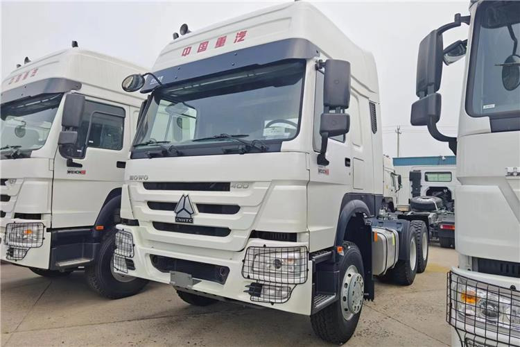 Sinotruk Used Howo Truck 400HP Tractor 6x4 Price for Sale In Tanzania - Tractor: foto 1 Sinotruk Used Howo Truck 400HP Tractor 6x4 Price for Sale In Tanzania - Tractor: foto 1