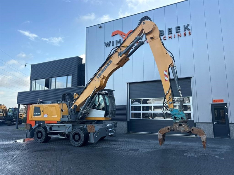 Manipulador de material para transporte de lixo Liebherr LH 30 M: foto 10