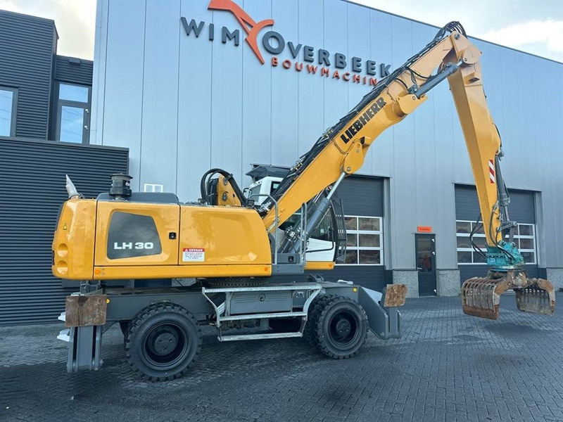 Manipulador de material para transporte de lixo Liebherr LH 30 M: foto 8
