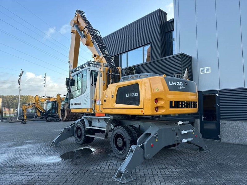 Manipulador de material para transporte de lixo Liebherr LH 30 M: foto 7