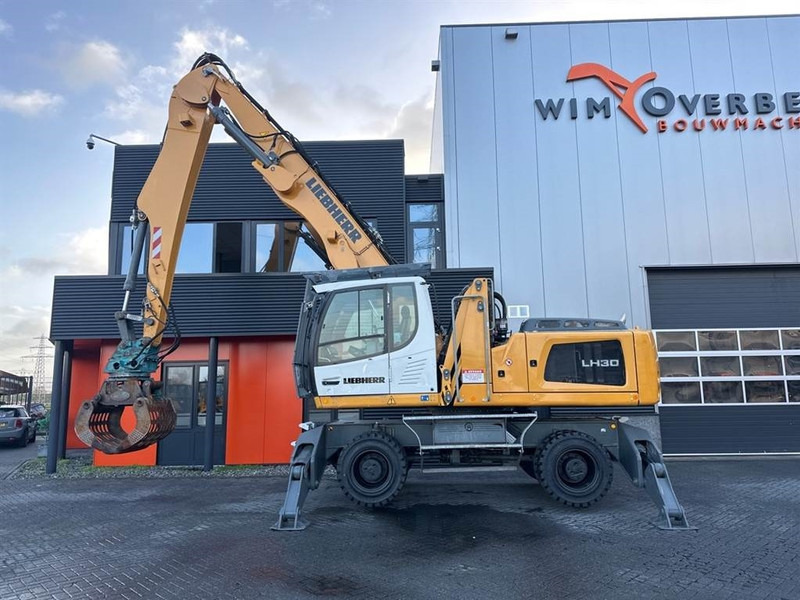 Manipulador de material para transporte de lixo Liebherr LH 30 M: foto 6