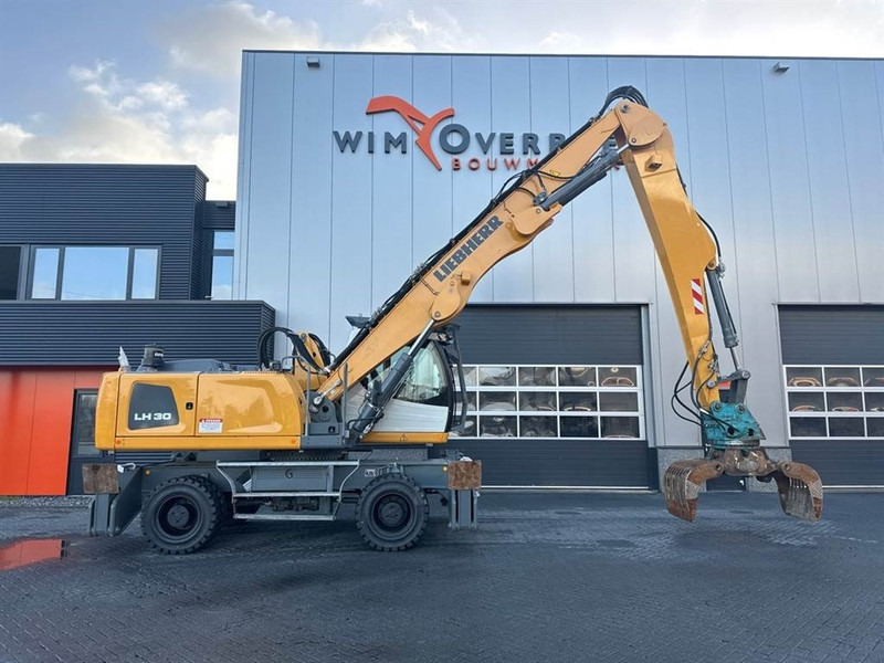 Manipulador de material para transporte de lixo Liebherr LH 30 M: foto 9
