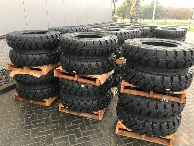 Trelleborg 10.00-20 Dual excavator solid-Tyre/Reifen/Banden - Jantes e pneus por Máquina de construção: foto 1 Trelleborg 10.00-20 Dual excavator solid-Tyre/Reifen/Banden - Jantes e pneus por Máquina de construção: foto 1
