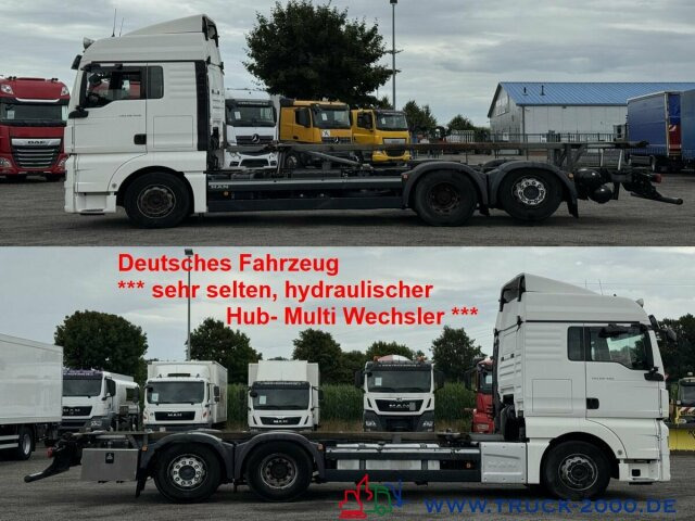 MAN TGX 26.480 XLX Haus Bett hydr Hub Multi Wechsler - Camião transportador de contêineres/ Caixa móvel: foto 1 MAN TGX 26.480 XLX Haus Bett hydr Hub Multi Wechsler - Camião transportador de contêineres/ Caixa móvel: foto 1